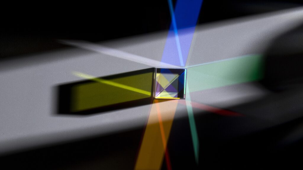 Prism dispersing colorful lights | NewRoad